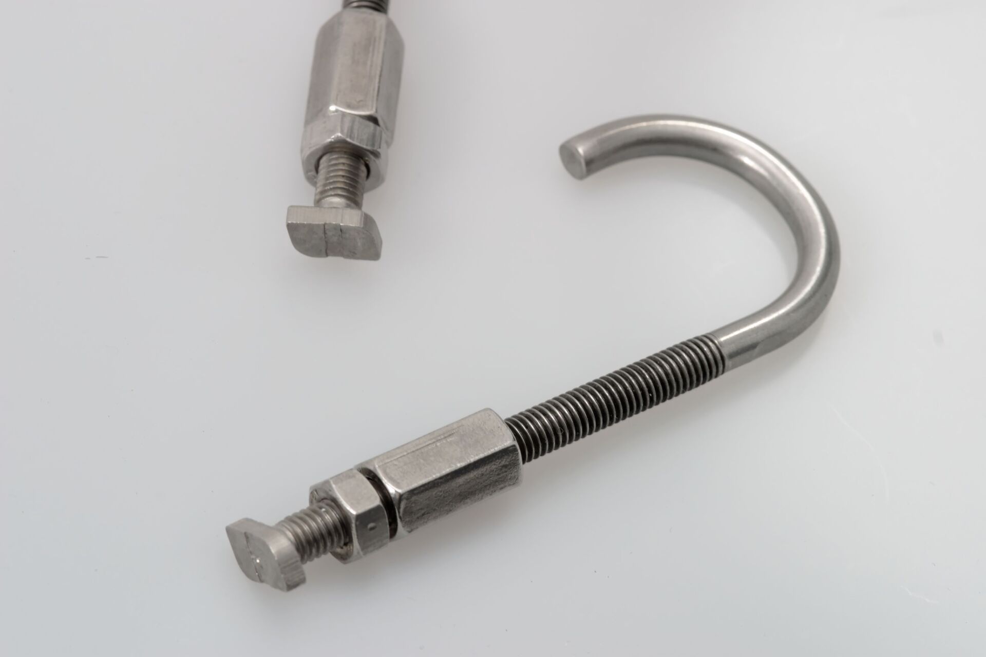 Rohr- Hakenkombination